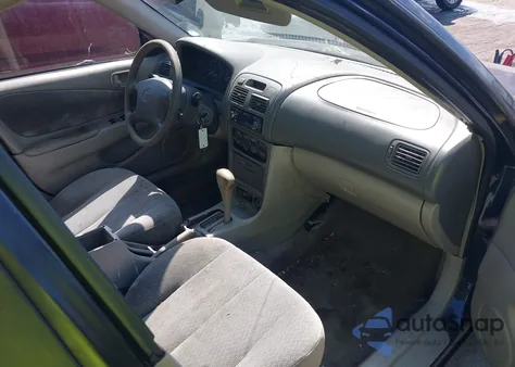 2002 Toyota Corolla Le из США, поврежденный, VIN 2T1BR12E52C583378